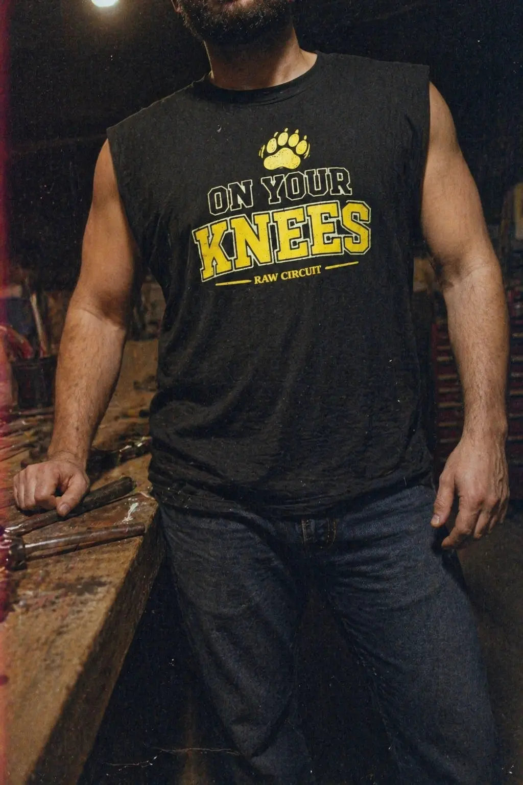 On Your Knees collegiate typography muscle tank — lifestyle shot — Raw Circuit