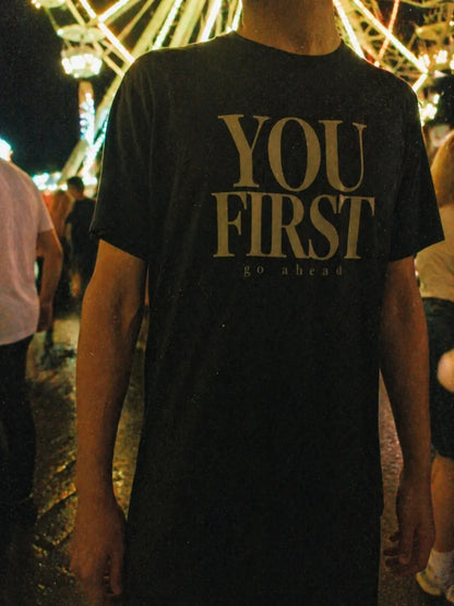 YOU FIRST go ahead black tee lifestyle shot — Raw Circuit