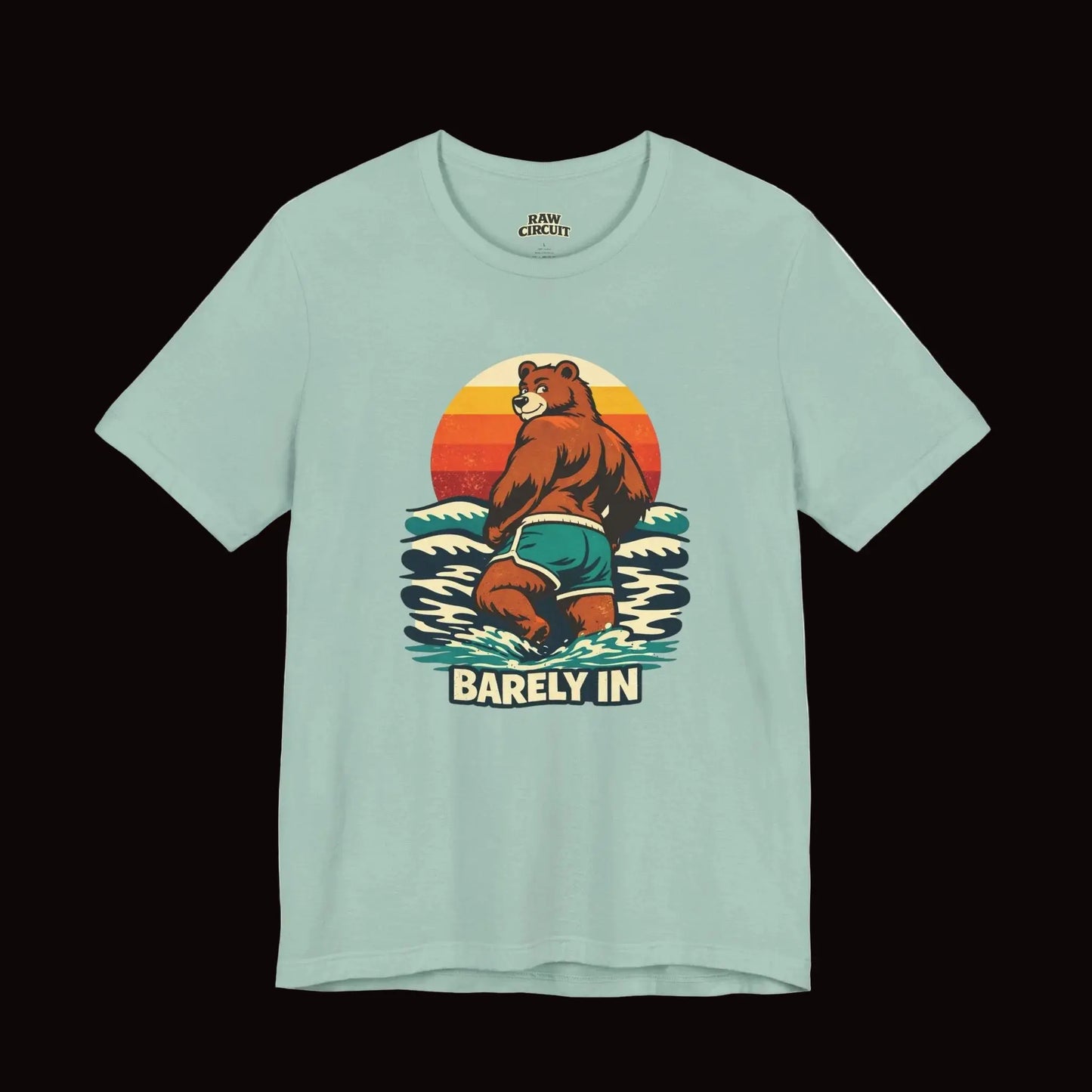 Retro “Barely In” bear graphic t-shirt with vintage sunset design on ivory background - Dusty teal