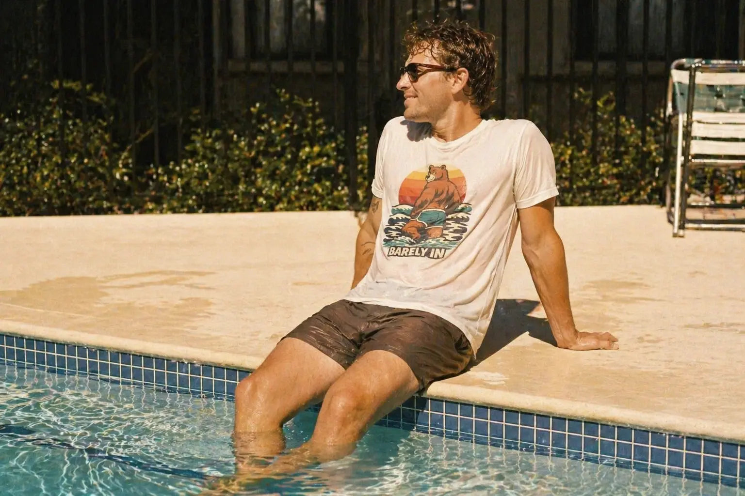 Barely In beach bear tee flat lay — dusty blue colorway — Raw Circuit