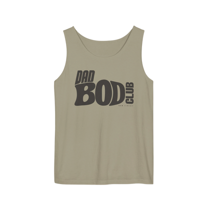 Sandstone garment-dyed tank top with dark charcoal DAD BOD CLUB typography printed across the chest.