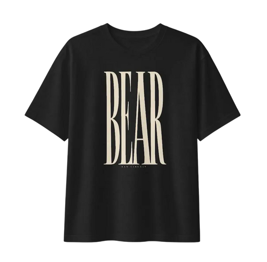 Oversized BEAR typography printed in custom hand-drawn editorial lettering on a heavyweight black and dust graphic t-shirt black.