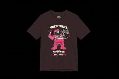 Multitudes Alter Ego graphic t-shirt by Raw Circuit featuring pink bear character with speaker and glow stick in retro style